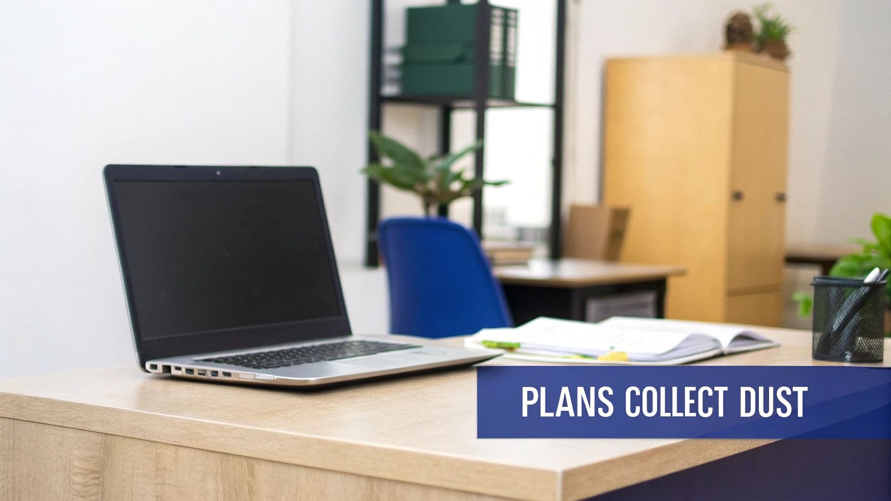 An office desk with a laptop, open book, and pen holder, emphasizing unused plans.
